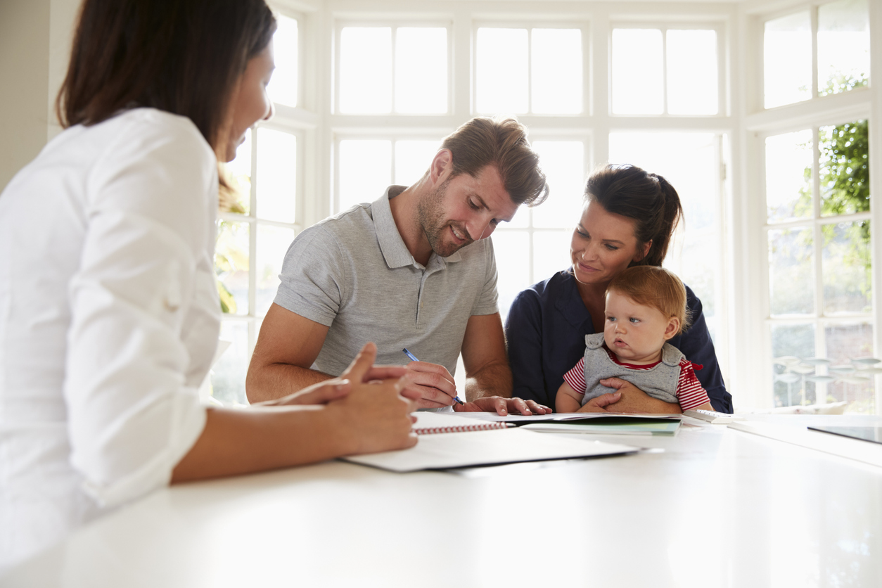 Happy family with insurance protection