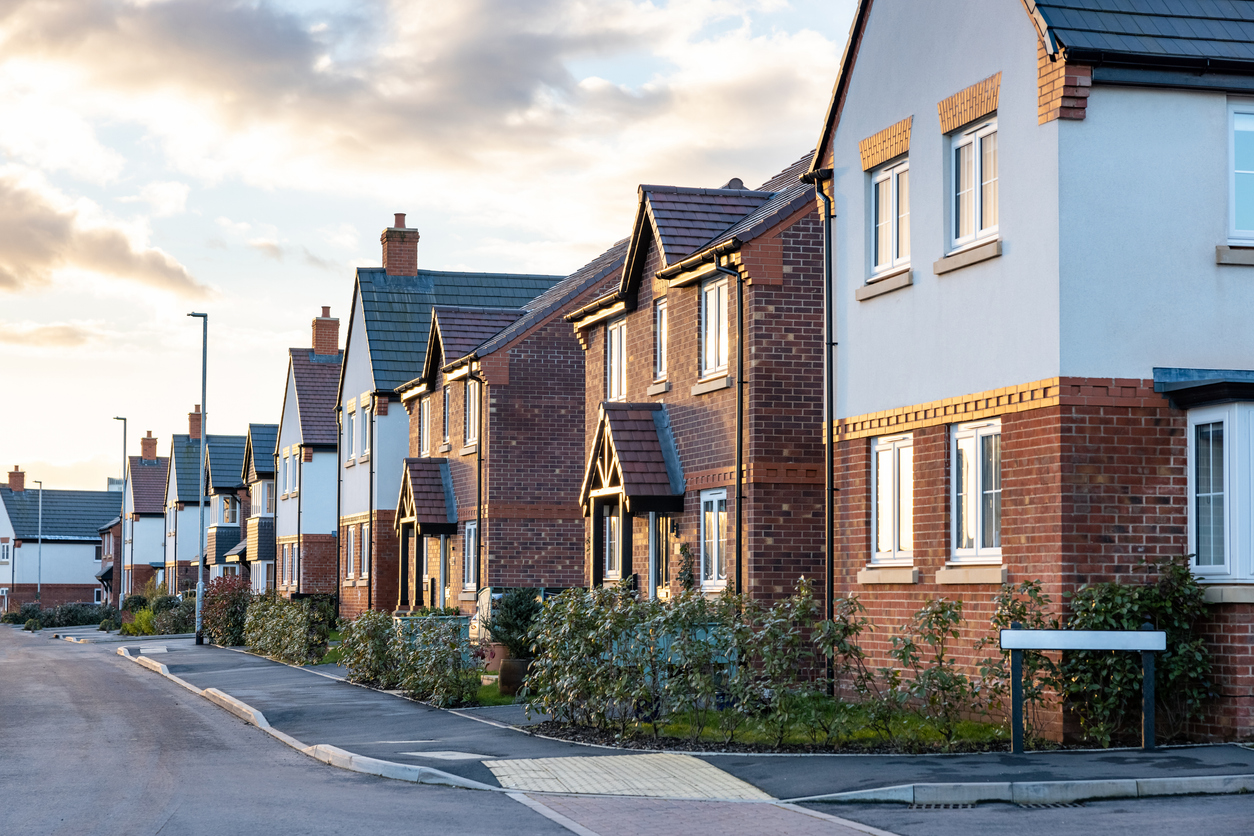 Warm, welcoming image of a family at home, reflecting mortgage protection and security